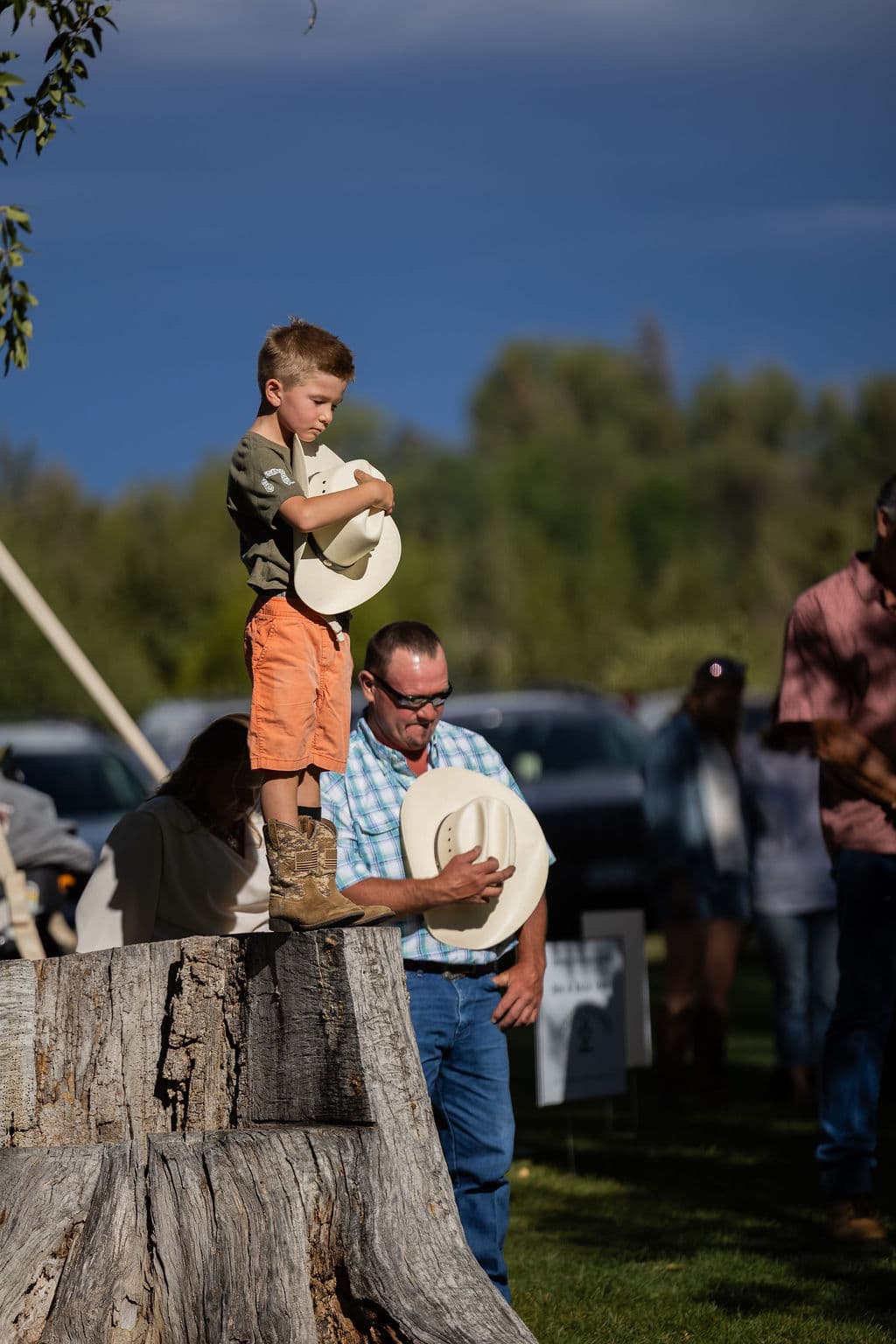 Child participating in the western gathering