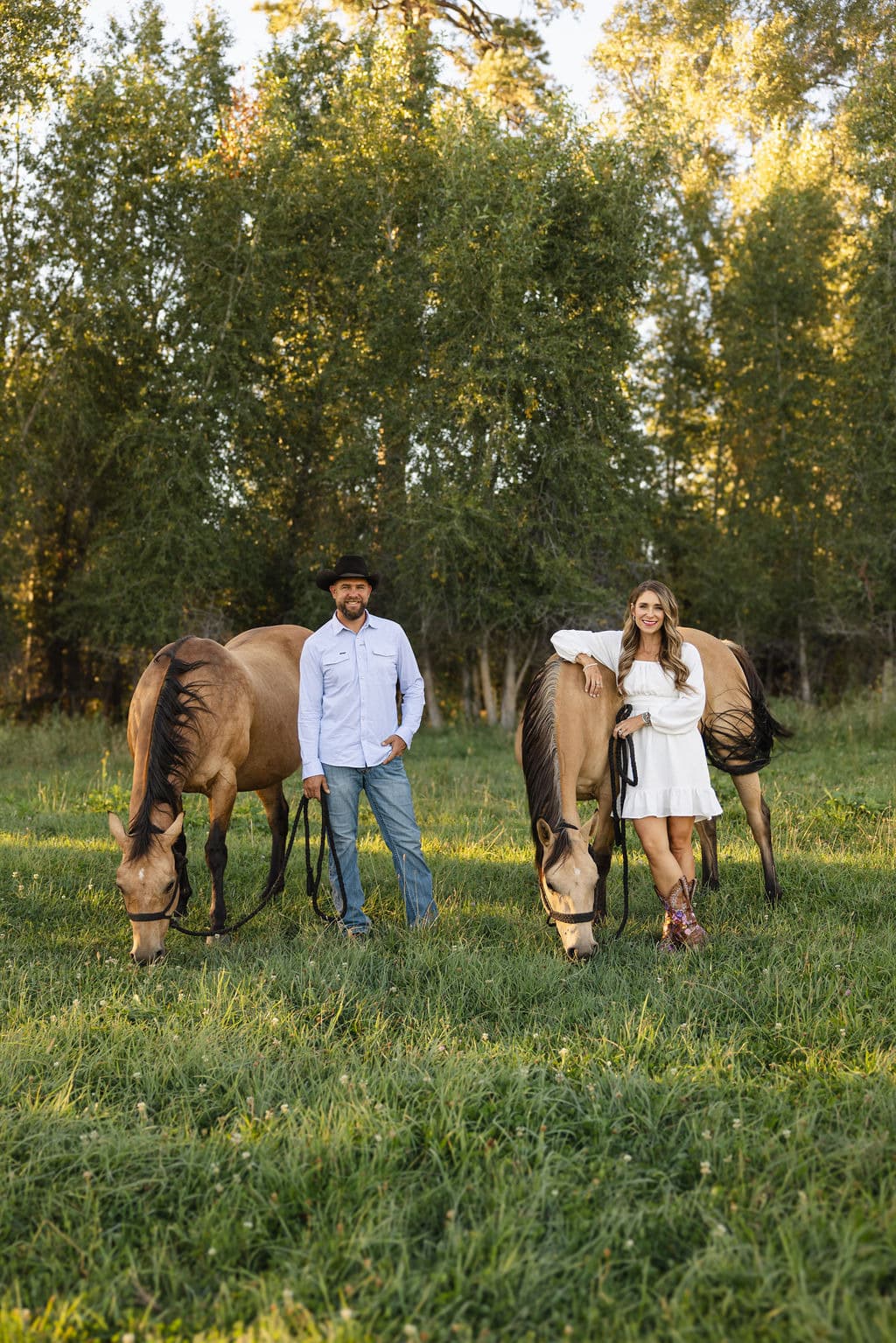 The Black family standing beside their horses at L-J Ranch.